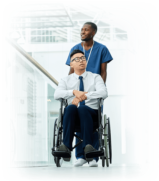 Healthcare provider quality management professional pushing a man in a wheelchair